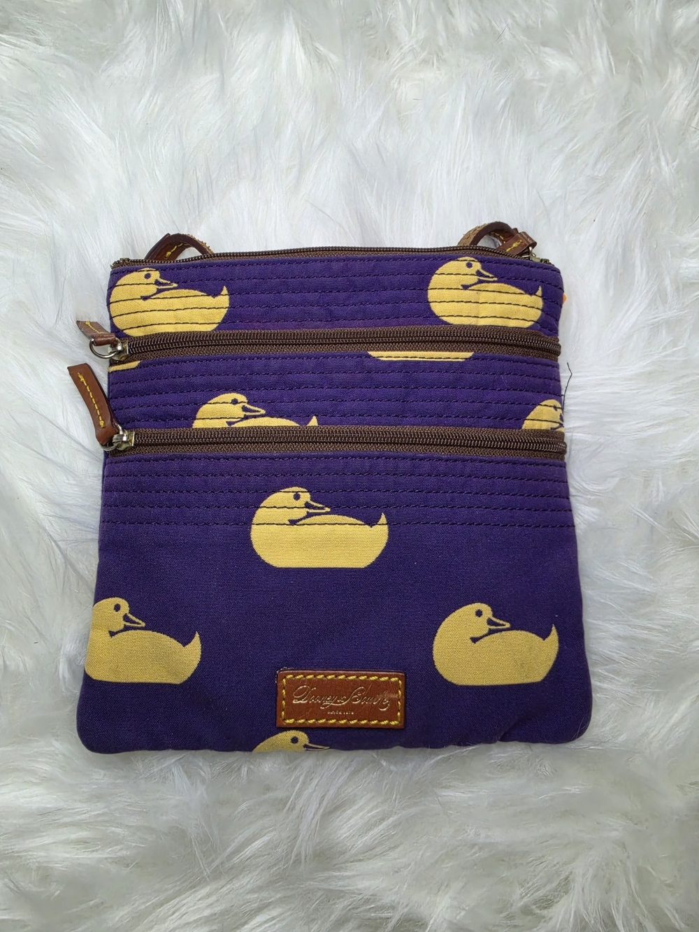 Dooney & Burke Crossbody Bag with Yellow Duck Print on Purple